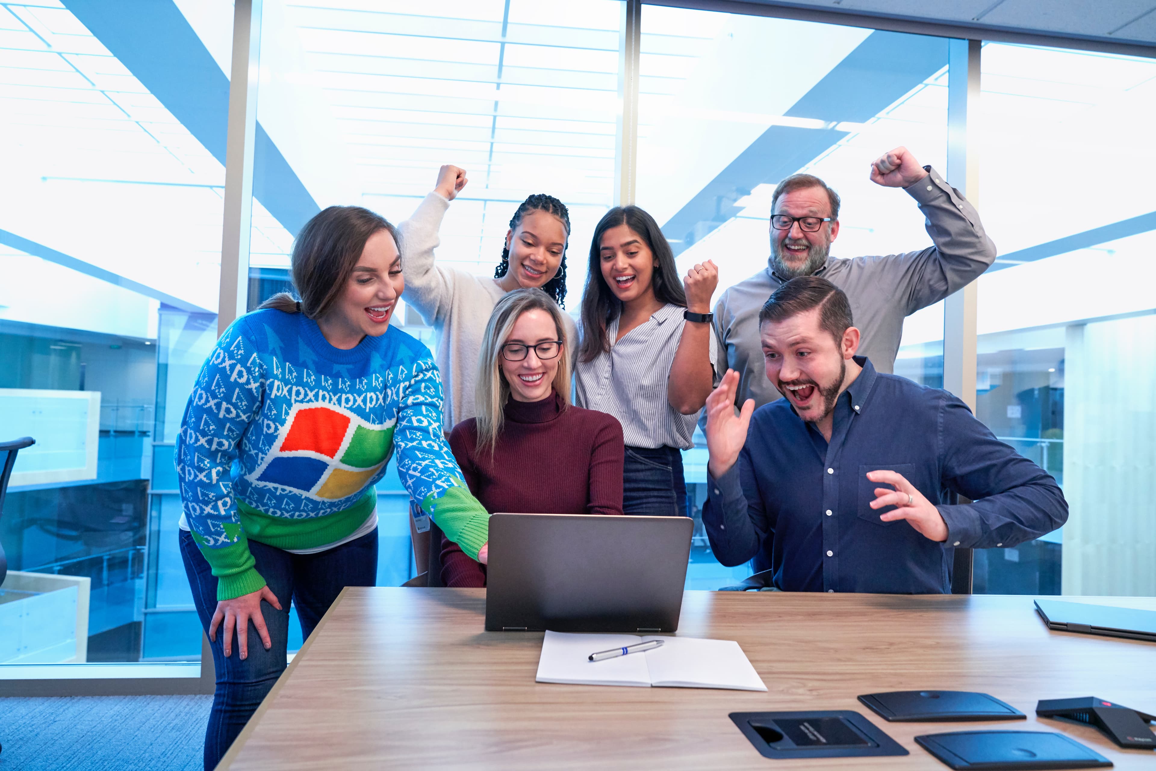 Festive holiday office party in #WindowsUglySweater Softwear by @Windows