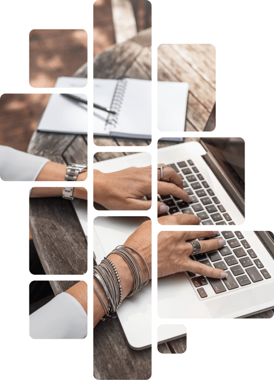 Hand of a lady typing on a macbook, wearing rings on both hands, bangles on the right hand and a wrist watch on the left